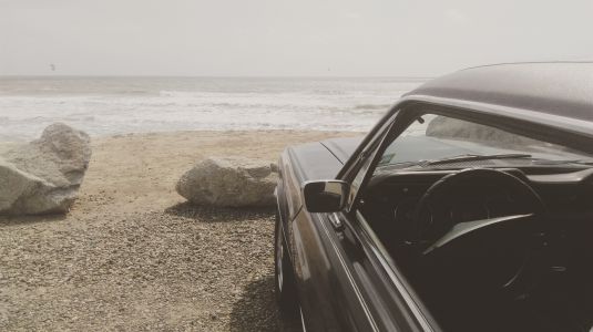 car by beach